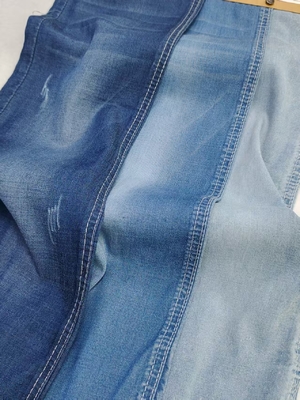 ซื้อ ผ้าเดนิมน้ำหนักเบา 4.7 ออนซ์ สไตล์ทวิลยืดหยุ่นเล็กน้อย 65% Tencel สำหรับกางเกงยีนส์เด็ก หรือเสื้อยืดในช่วงฤดูร้อน online manufacture